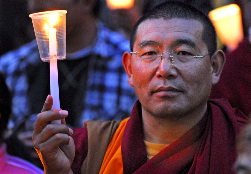 File:Buddhist monk at a pro democracy rally against the Burmese regime in Australia .jpg