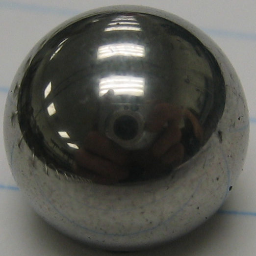 File:Photograph of specular reflection on a marble.jpg