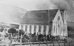 (PD) Photo: U.S. Historic American Buildings Survey / California Historical Society In 1890 a Norman-style structure (seen here before the spire was added) was constructed in place of the original chapel. The new building served as the parish church until 1965.