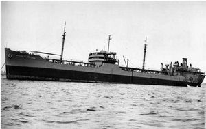 (PD) Photo: United States Navy USNS Mission Santa Cruz (T-AO-133) at anchor, date and location unknown.