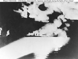 USS Quincy under Japanese fire