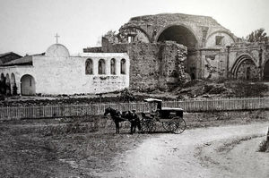 (PD) Photo: Unknown A horse-drawn carriage pauses for a photo in front of Mission San Juan Capistrano.