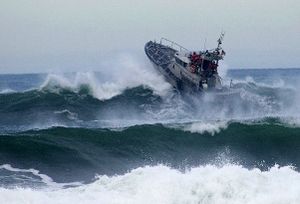 A motor lifeboat braving heavy waves off Tillamook Bay, Oregon.jpg