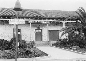 (PD) Photo: U.S. Historic American Buildings Survey / San Francisco Chronicle Library In the early part of the 1900's a sign was erected on the roof of the museum which incorrectly identified the facility as Mission San José de Guadalupe.
