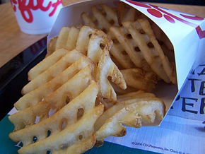 Waffle fries. Potatoes are cut crossways with a special tool to form the unique "waffle" shape, then prepared. These waffle fries are made by Chik-fil-A, a popular fast-food chain restaurant in the United States, who is sometimes cited as popularizing the cut.