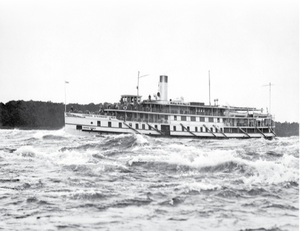 Passenger vessel Rapids Prince transits the Long Sault Rapids, near Cornwall, on the St. Lawrence River..png