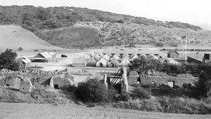 (PD) Photo: National Park Service The ruins of the original chapel at Mission La Purísima Concepción in 1934. The Civilian Conservation Corps encampment can be seen in the background.