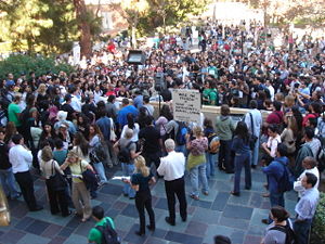 Picture of people assembled outside as a protest.