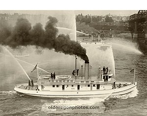 Fireboats David Campbell, George Williams, displaying on the Willamette River.jpg