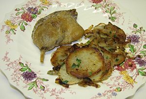 Lyonnaise potatoes served with Confit of duck
