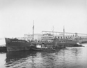 (PD) Photo: United States Navy USNS Mission Capistrano (T-AO-112) moored pierside, Port of Los Angeles, Berth 232, date unknown.