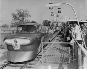 © Photo: Los Angeles Examiner / USC Regional Historical Photo Collection One of the two Santa Fe and Disneyland Railroad's Viewliner trains prepares to depart the Tomorrowland station in 1957 with Walt Disney himself manning the controls.