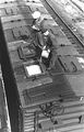 (PD) Photo: U.S. Farm Security Administration - Office of War Information Workmen fill up an FGE reefer's top-mounted bunkers with crushed ice.