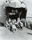 Vietnamese refugees boarding the US Navy ship LST 516 during Operation Passage to Freedom, October 1954.